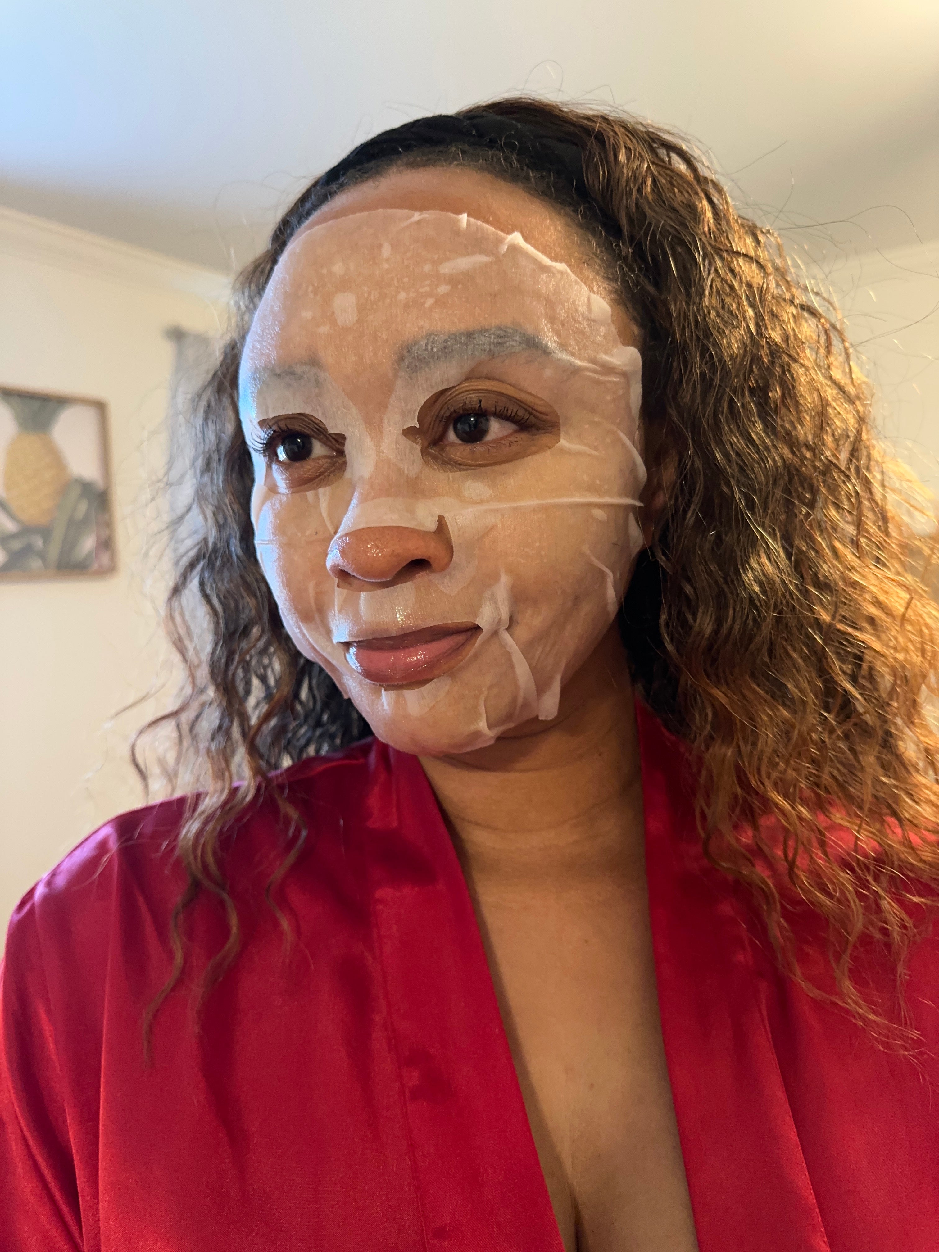 Black Woman with snail mask on